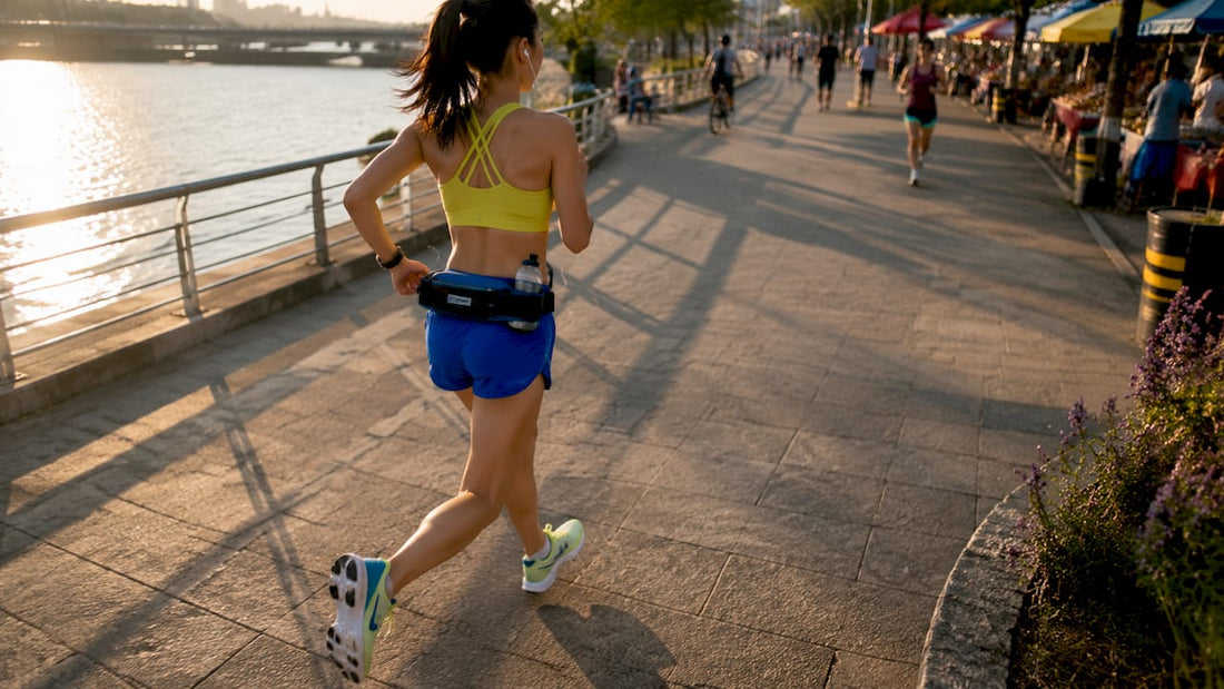 Young woman jogging on a suburban running path
