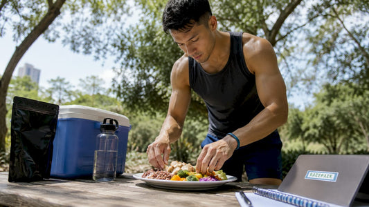 Athlete preparing pre-workout meal in kitchen