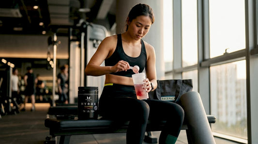 Athlete preparing carbohydrate drink during workout