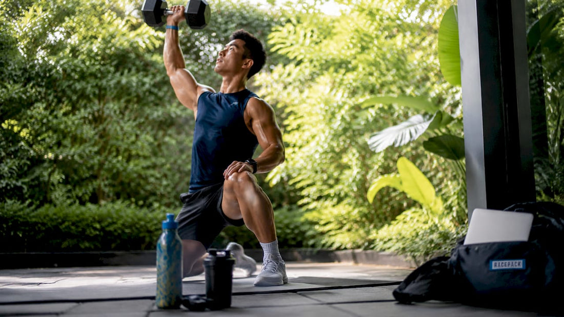 Athlete lifting dumbbell after workout