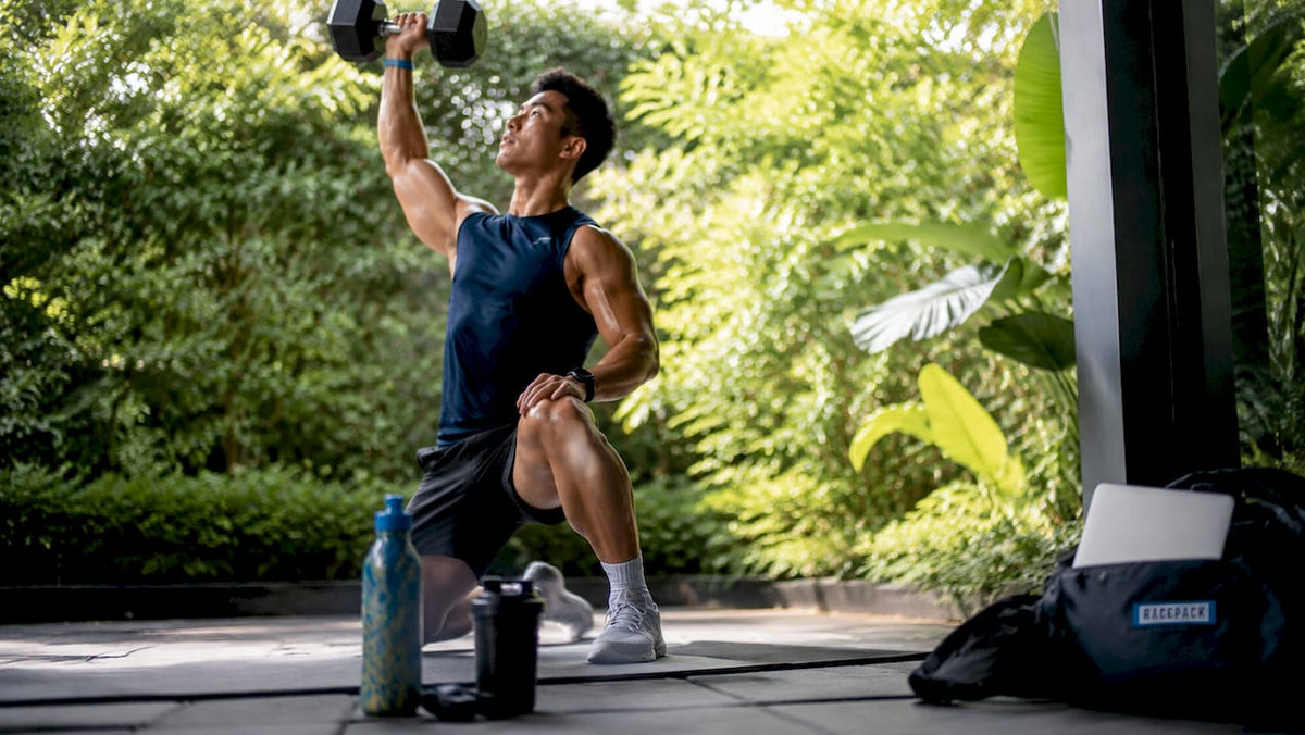 Athlete lifting dumbbell after workout