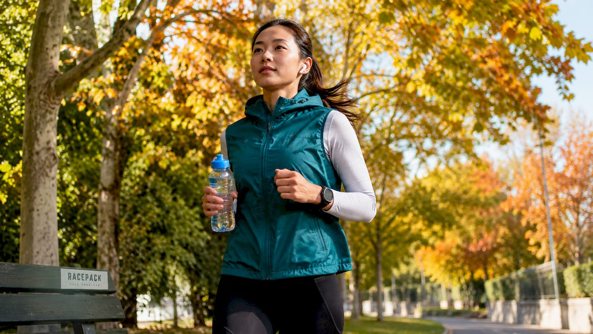 Woman jogging outdoors in early morning