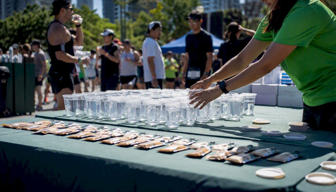 Marathon fueling station with water cups and energy gels