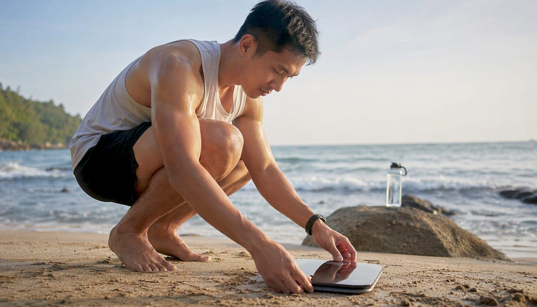 Athlete weighing on digital scale outdoors