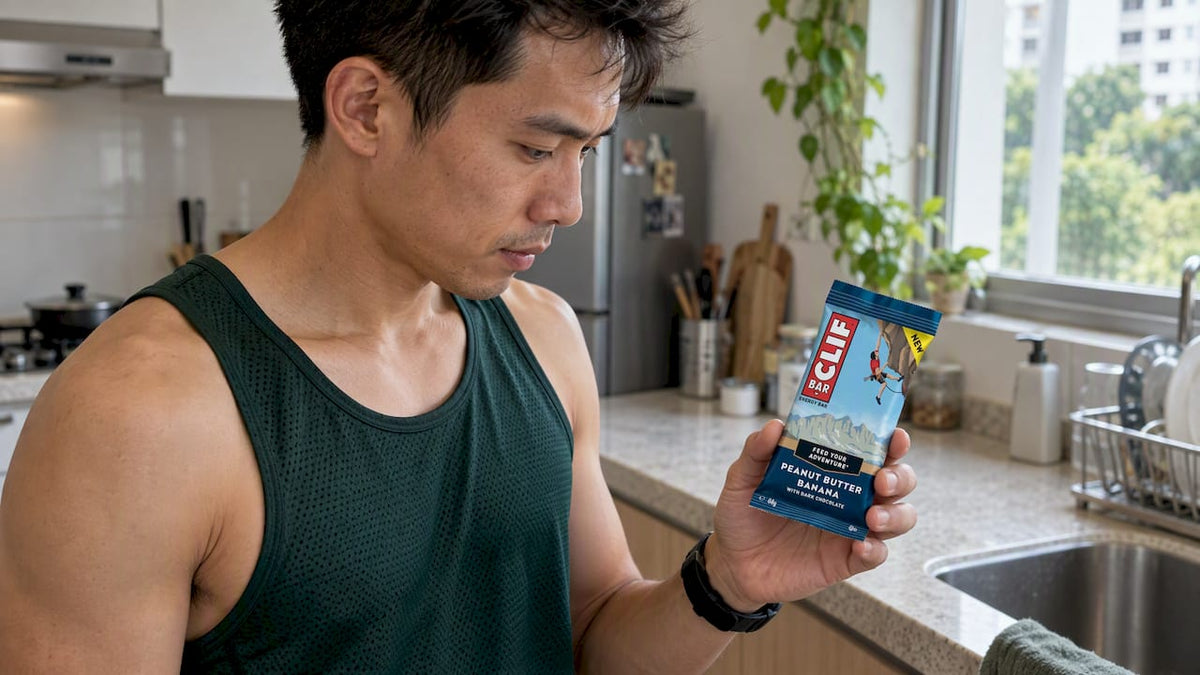 Runner checking a CLIF Bar at home