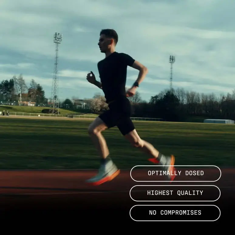 Runner training on an outdoor athletics track