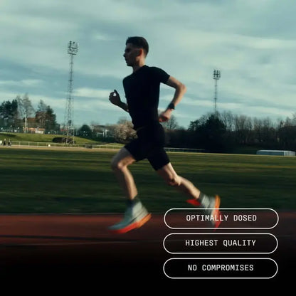Runner training on an outdoor athletics track